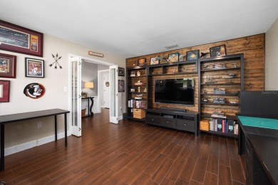 Welcome to this spacious 4-bedroom, 2-bath home located in the on Gainesville Golf and Country Club in Florida - for sale on GolfHomes.com, golf home, golf lot