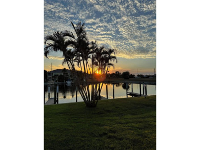 FULLY-FURNISHED, PGI WATERFRONT CONDO W/DEEDED DOCK & SAIL on Saint Andrews South Golf Club in Florida - for sale on GolfHomes.com, golf home, golf lot