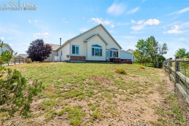 Beautiful ranch home backing to Antler Creek Golf Course with on Antler Creek Golf Course in Colorado - for sale on GolfHomes.com, golf home, golf lot