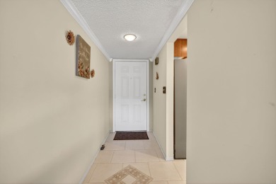 Beautiful  2 bedroom 2 bath ''Beachtree'' condo with a private on Ocean Village Golf Course in Florida - for sale on GolfHomes.com, golf home, golf lot