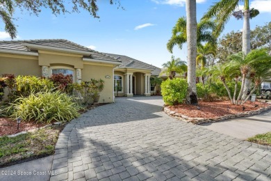 This stunning executive home exudes modern elegance and boasts on Baytree National Golf Links in Florida - for sale on GolfHomes.com, golf home, golf lot