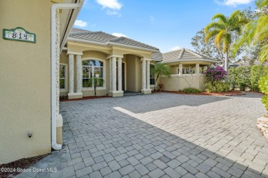 This stunning executive home exudes modern elegance and boasts on Baytree National Golf Links in Florida - for sale on GolfHomes.com, golf home, golf lot