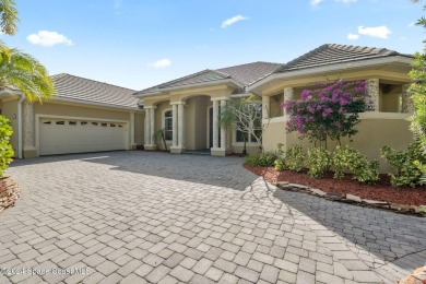 This stunning executive home exudes modern elegance and boasts on Baytree National Golf Links in Florida - for sale on GolfHomes.com, golf home, golf lot