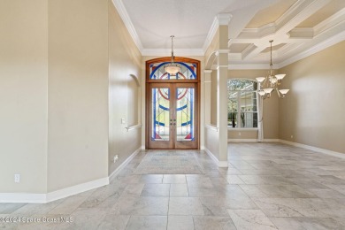 This stunning executive home exudes modern elegance and boasts on Baytree National Golf Links in Florida - for sale on GolfHomes.com, golf home, golf lot