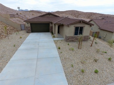 Nestled at 1410 Dutchman TRL, Bullhead City, Arizona, this on Laughlin Ranch Golf Club in Arizona - for sale on GolfHomes.com, golf home, golf lot