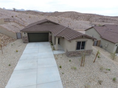 Nestled at 1410 Dutchman TRL, Bullhead City, Arizona, this on Laughlin Ranch Golf Club in Arizona - for sale on GolfHomes.com, golf home, golf lot