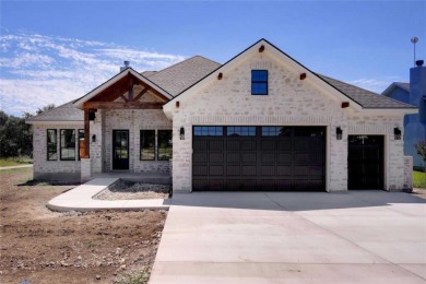 This breathtaking 3-bedroom, 2-bathroom, 2,036 sq ft custom home on Vaaler Creek Golf Club in Texas - for sale on GolfHomes.com, golf home, golf lot