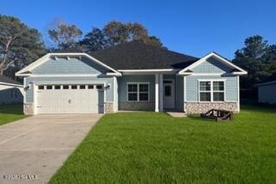 Home is complete. The 2100 floor plan by Adams Homes is a on River Landing Golf Course in North Carolina - for sale on GolfHomes.com, golf home, golf lot