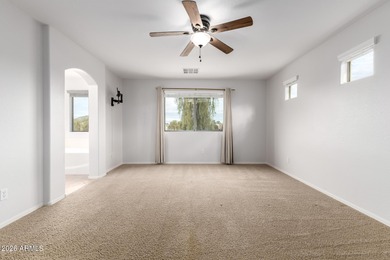 Step inside this beautifully updated 4-bedroom, 2.5-bath home on Dave White Reg Park and Golf Course in Arizona - for sale on GolfHomes.com, golf home, golf lot