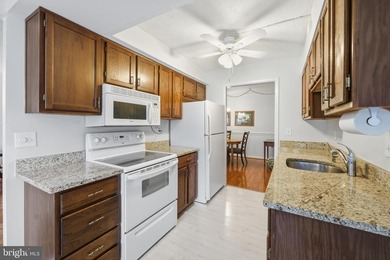 Life is easy in this turn-key 3BR/2FB Leisure World condo! on Leisure World Golf Club in Maryland - for sale on GolfHomes.com, golf home, golf lot