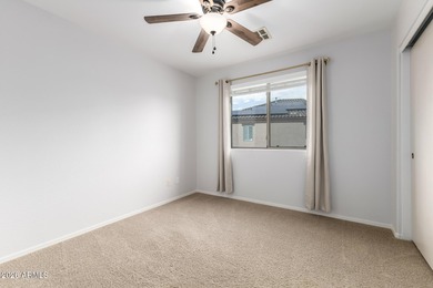 Step inside this beautifully updated 4-bedroom, 2.5-bath home on Dave White Reg Park and Golf Course in Arizona - for sale on GolfHomes.com, golf home, golf lot