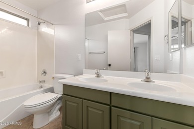 Step inside this beautifully updated 4-bedroom, 2.5-bath home on Dave White Reg Park and Golf Course in Arizona - for sale on GolfHomes.com, golf home, golf lot