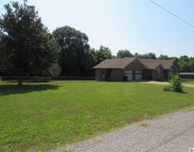 One Life to Live so start enjoying it now! This 3 BR, 2 1/2 bath on Boots Randolph Golf Course in Kentucky - for sale on GolfHomes.com, golf home, golf lot