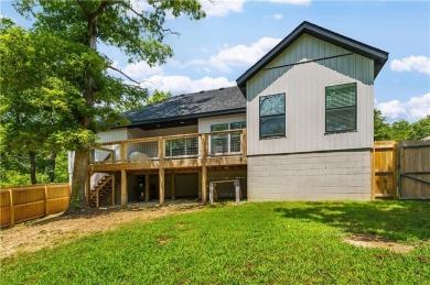 Welcome to this lovely 2-year-old home nestled in a quiet on Bella Vista Country Club - Highlands in Arkansas - for sale on GolfHomes.com, golf home, golf lot