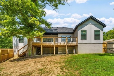 Welcome to this lovely 2-year-old home nestled in a quiet on Bella Vista Country Club - Highlands in Arkansas - for sale on GolfHomes.com, golf home, golf lot