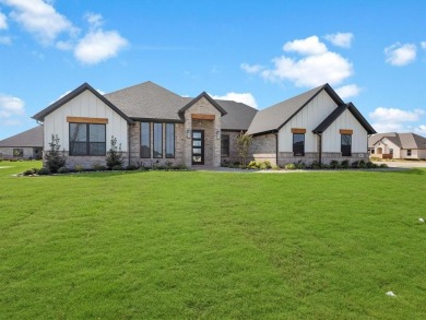 Experience refined living in the exclusive, guard-gated on Pecan Plantation Country Club in Texas - for sale on GolfHomes.com, golf home, golf lot
