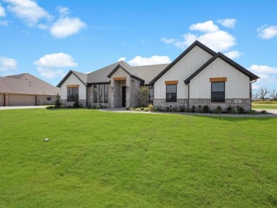Experience refined living in the exclusive, guard-gated on Pecan Plantation Country Club in Texas - for sale on GolfHomes.com, golf home, golf lot