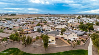 Step inside this beautifully updated 4-bedroom, 2.5-bath home on Dave White Reg Park and Golf Course in Arizona - for sale on GolfHomes.com, golf home, golf lot