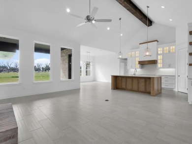 Experience refined living in the exclusive, guard-gated on Pecan Plantation Country Club in Texas - for sale on GolfHomes.com, golf home, golf lot