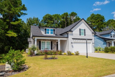 Step into this nearly new home where thoughtful design and on Brunswick Plantation and Golf Resorts in North Carolina - for sale on GolfHomes.com, golf home, golf lot