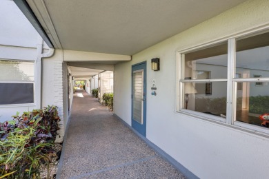 Welcome home to this charming first-floor corner 2-bedroom on Kings Point Golf - Executive in Florida - for sale on GolfHomes.com, golf home, golf lot