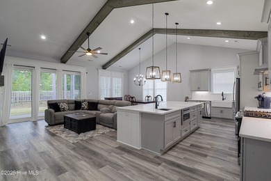 Step into this nearly new home where thoughtful design and on Brunswick Plantation and Golf Resorts in North Carolina - for sale on GolfHomes.com, golf home, golf lot