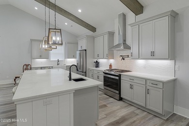 Step into this nearly new home where thoughtful design and on Brunswick Plantation and Golf Resorts in North Carolina - for sale on GolfHomes.com, golf home, golf lot