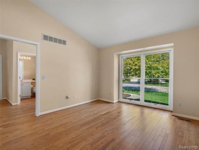 MAIN FLOOR LIVING in THE HEATHERS! This spacious condo offers a on The Heathers Club in Michigan - for sale on GolfHomes.com, golf home, golf lot