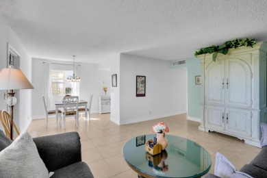 Welcome home to this charming first-floor corner 2-bedroom on Kings Point Golf - Executive in Florida - for sale on GolfHomes.com, golf home, golf lot