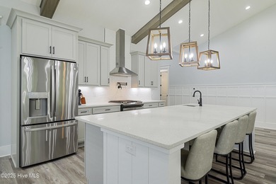 Step into this nearly new home where thoughtful design and on Brunswick Plantation and Golf Resorts in North Carolina - for sale on GolfHomes.com, golf home, golf lot