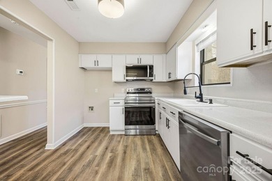 Freshly renovated and truly turnkey, this serene single-level on Asheville Municipal Golf Course in North Carolina - for sale on GolfHomes.com, golf home, golf lot