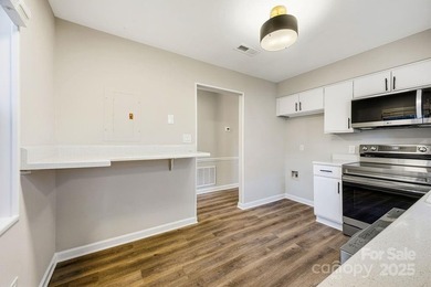 Freshly renovated and truly turnkey, this serene single-level on Asheville Municipal Golf Course in North Carolina - for sale on GolfHomes.com, golf home, golf lot