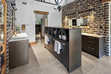 Experience luxury redefined in this private 6,021 SqFt custom on The Traditions Club At Texas A and M in Texas - for sale on GolfHomes.com, golf home, golf lot