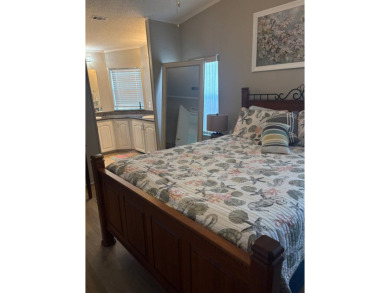Come and see this richly decorated home. Located in The Heritage on Sabal Springs Golf and Racquet Club in Florida - for sale on GolfHomes.com, golf home, golf lot