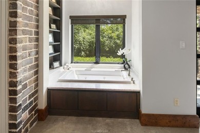 Experience luxury redefined in this private 6,021 SqFt custom on The Traditions Club At Texas A and M in Texas - for sale on GolfHomes.com, golf home, golf lot