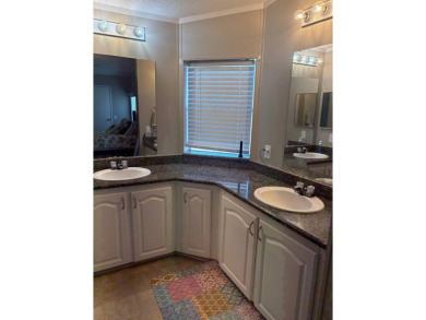 Come and see this richly decorated home. Located in The Heritage on Sabal Springs Golf and Racquet Club in Florida - for sale on GolfHomes.com, golf home, golf lot