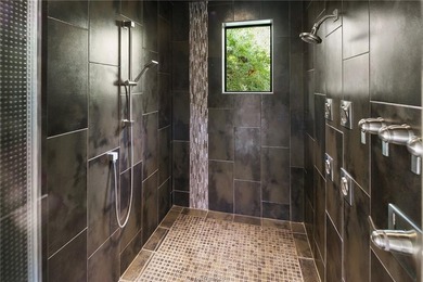 Experience luxury redefined in this private 6,021 SqFt custom on The Traditions Club At Texas A and M in Texas - for sale on GolfHomes.com, golf home, golf lot