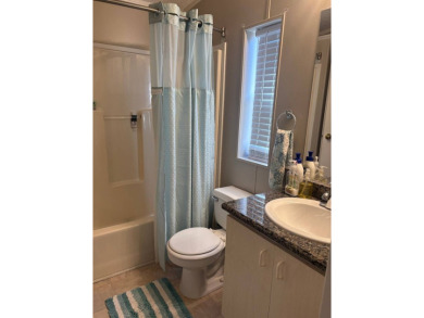 Come and see this richly decorated home. Located in The Heritage on Sabal Springs Golf and Racquet Club in Florida - for sale on GolfHomes.com, golf home, golf lot