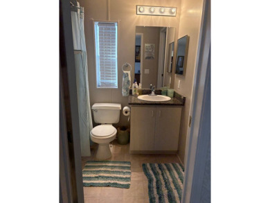 Come and see this richly decorated home. Located in The Heritage on Sabal Springs Golf and Racquet Club in Florida - for sale on GolfHomes.com, golf home, golf lot