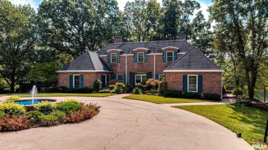 Nestled along the tranquil shores of a pristine lake, this on Carlinville Country Club in Illinois - for sale on GolfHomes.com, golf home, golf lot