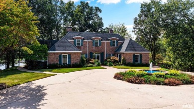 Nestled along the tranquil shores of a pristine lake, this on Carlinville Country Club in Illinois - for sale on GolfHomes.com, golf home, golf lot