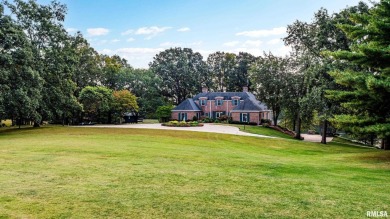 Nestled along the tranquil shores of a pristine lake, this on Carlinville Country Club in Illinois - for sale on GolfHomes.com, golf home, golf lot