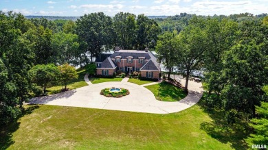 Nestled along the tranquil shores of a pristine lake, this on Carlinville Country Club in Illinois - for sale on GolfHomes.com, golf home, golf lot