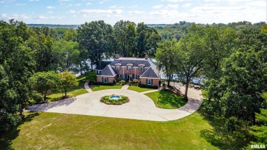 Nestled along the tranquil shores of a pristine lake, this on Carlinville Country Club in Illinois - for sale on GolfHomes.com, golf home, golf lot