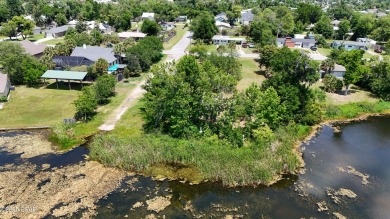 WATERFRONT! Large lot located in the highly desired 'Lynn Haven' on Panama Country Club in Florida - for sale on GolfHomes.com, golf home, golf lot