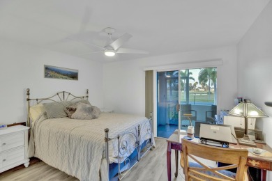 Remarkably renovated 1st floor corner unit located in Vista on Vero Beach South Golf Course in Florida - for sale on GolfHomes.com, golf home, golf lot