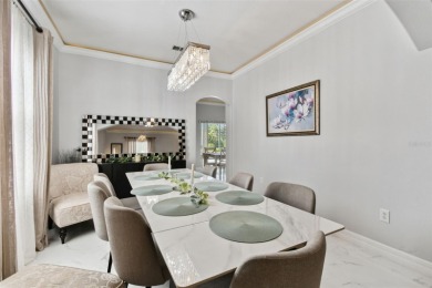 This 4 bedroom and 2.5 bath home has a great pond view, and is on Heritage Isles Golf and Country Club in Florida - for sale on GolfHomes.com, golf home, golf lot