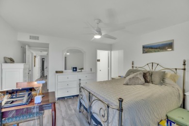 Remarkably renovated 1st floor corner unit located in Vista on Vero Beach South Golf Course in Florida - for sale on GolfHomes.com, golf home, golf lot