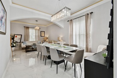 This 4 bedroom and 2.5 bath home has a great pond view, and is on Heritage Isles Golf and Country Club in Florida - for sale on GolfHomes.com, golf home, golf lot