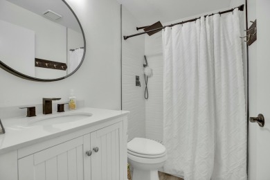 Remarkably renovated 1st floor corner unit located in Vista on Vero Beach South Golf Course in Florida - for sale on GolfHomes.com, golf home, golf lot
